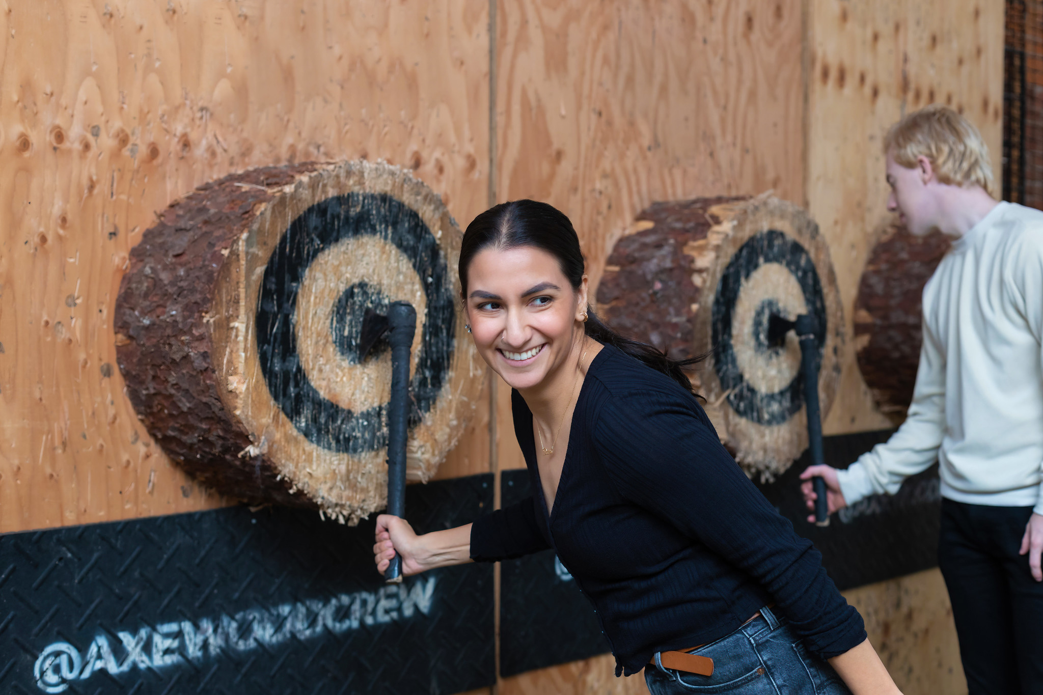 Axe stuck in target at Academie Duello