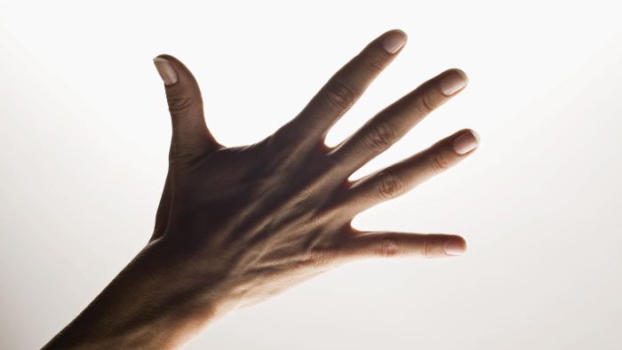 Hand showing five fingers