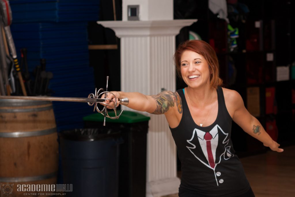 Smiling rapier fencer