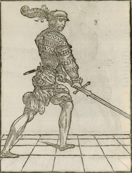 Fencer practicing cinghiara larga guard