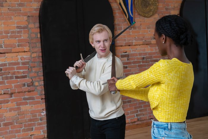 Students practicing longsword techniques